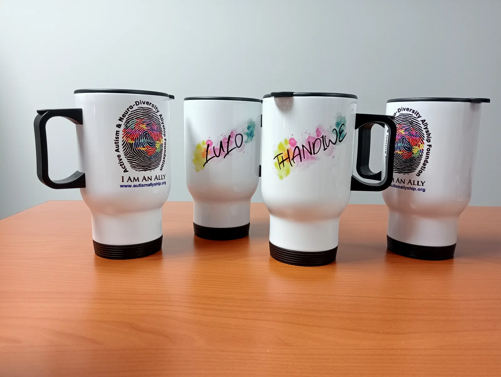 Autism Allyship travel mugs